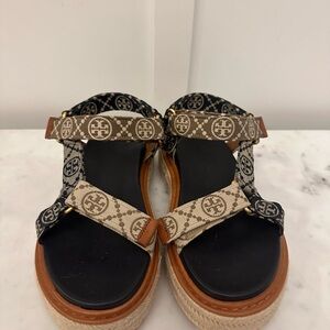 Tory Burch Black and Tan Sandals with Intricate Straps and Ankle Buckles